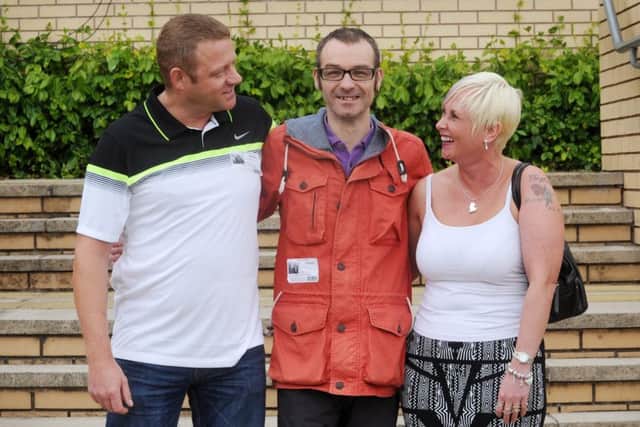 Alex and Tracy Asquith, pictured with Raymond Tait. Picture by Simon Hulme.