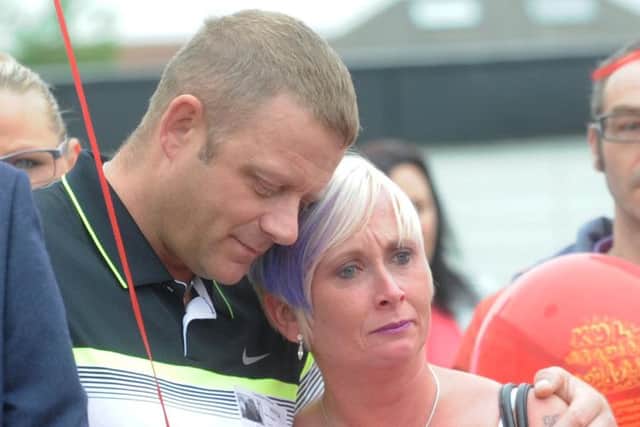 Tracy and Alex Asquith, the parents of Kyle Asquith, pictured at Cockburn School. Picture by Simon Hulme.