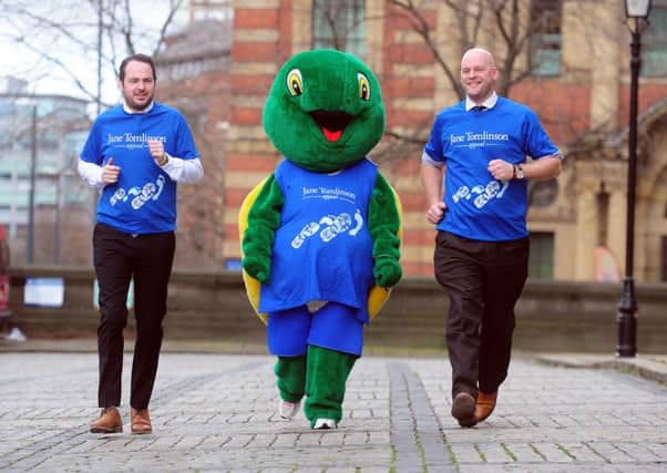 Matthew Burton (left) and fellow Educating Yorkshire star Jonny Mitchell with race mascot Tommo the Tortoise at the official launch of the 2014  Leeds 10k