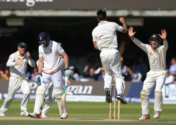 GAME'S UP: England's Jos Butler (second left) is out for 11 off the bowling of Australia's Mitchell Johnson. Picture: John Walton/PA