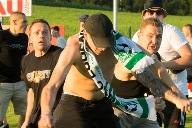 Frankfurt and Leeds fans clash after Tuesday's friendly in Eugendorf. Photo: PA Wire