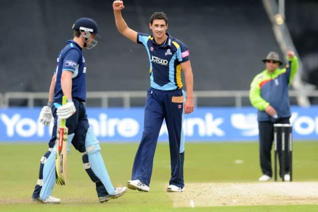 Mitchell Starc celebrates the dismissal of Dan Redfern for Yorkshire back in 2012.