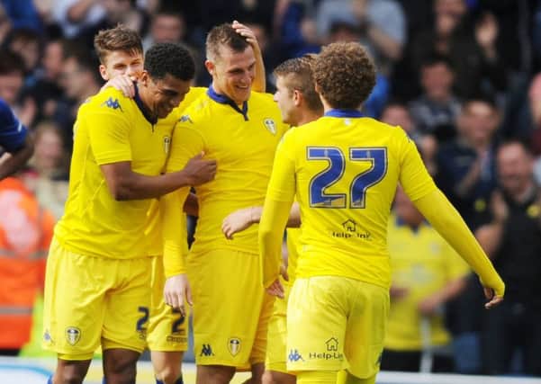 Chris Wood celebrates scoring his first goal for Leeds United against Everton.