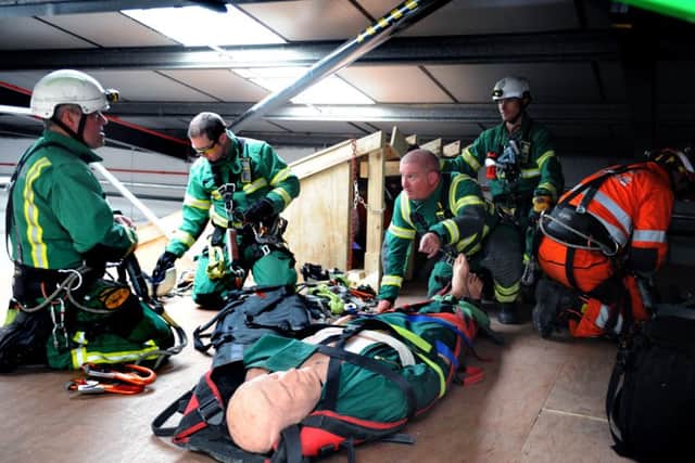 Training programme to ensure blue light responders work seamlessly together at any search and rescue incident at the Yorkshire Ambulance Service NHS Trust Hazardous Area Response Team Facility in Beeston, Leeds.
7th August 2015.
Picture Jonathan Gawthorpe.
