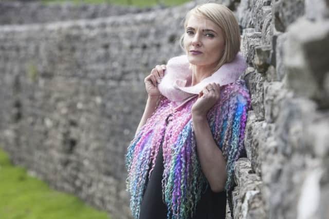 Shoulder capelet made fromTeeswaterlocks felted onto Blue Faced Leicester fibres with added bamboo fibres. All hand dyed.