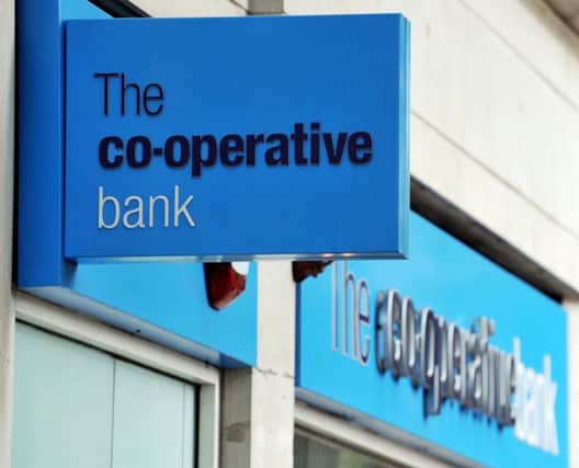 A Co-perative Bank sign in Holborn, London Photo: Nick Ansell/PA Wire