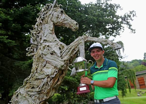 Marcus Armitage with the Tree of Life Championship trophy (Picture: HotelPlanner.com PGA EuroPro Tour).