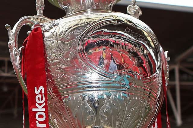 Thousands of fans are arriving at Wembley Stadium for the Rugby League's Challenge Cup final.