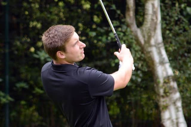 Pontefracts Tom Hough watches a shot carefully on his way to a 2&1 victory over Howley Halls Tom North in the Leeds & District Unions junior individial final at Low Laithes (Picture: Chris Stratford).