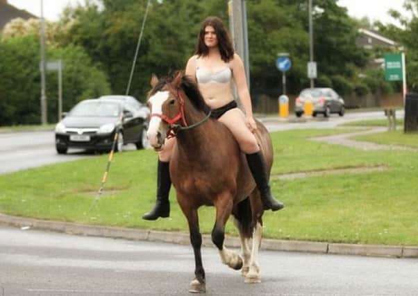 Gayle Finnis, 19, from Aylesbury took the brave step to encourage drivers to slow down for horses
