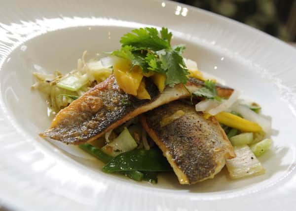 Sea Bass with mango and oriental vegetables. PIC: Bruce Rollinson