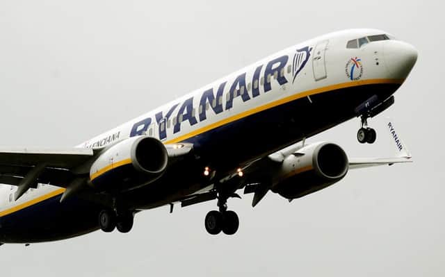 File photo dated 02/07/12 of a Ryanair plane, as the no frills airline became the latest airline to thank the wet summer weather and strong pound for helping profits take off as it upped its outlook for the full year. PRESS ASSOCIATION Photo. Issue date: Wednesday September 9, 2015. The airline said holidaymakers booking last minute deals to escape the dismal end to the summer helped its passenger numbers jump 13% in the first half of its financial year and is expecting a 15% hike in the third quarter. See PA story CITY Ryanair. Photo credit should read: Rui Vieira/PA Wire