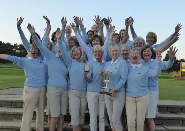 Moortown celebrate their victory in the YLCGA A team championship.