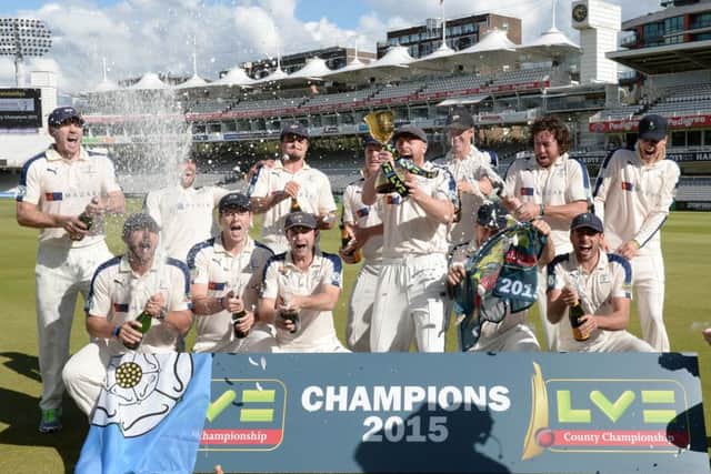 PARTY TIME: Yorkshire's players pop the Champagne corks to celebrate retaining the County championship title. Picture: PA.