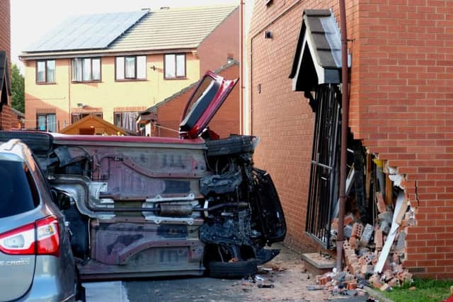 The scene on Sandlewood Close, Holbeck. Picture by Simon Hulme
