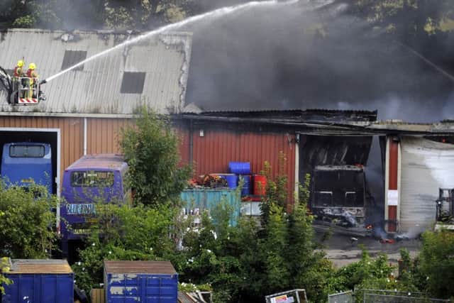 Firefighters battling the blaze at Geldards Coaches on August 6
