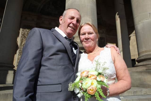 Christine Sharlotte (nee Carroll) and Taffy Sharlotte were married at Leeds Town Hall. Picture: Ross Parry Agency