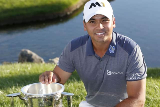 Australia's Jason Day after his BMW Championship Trophy win (Picture: Charles Rex Arbogast/AP).