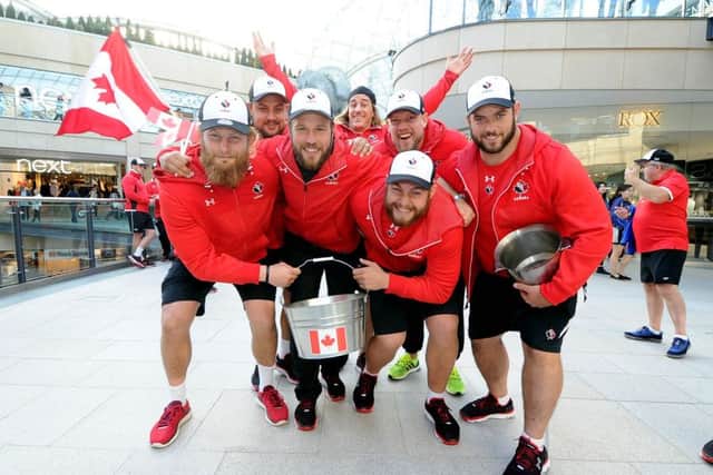Canadian rugby players sing their national anthem and raise funds for national hero Terry Fox in Leeds. Picture James Hardisty