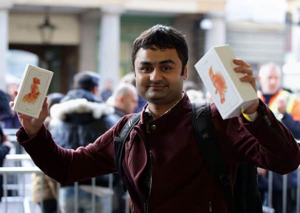 Sam Shaikh, 29, from Stratford, was the first customer to get the new iPhone 6s at The Apple Store in London