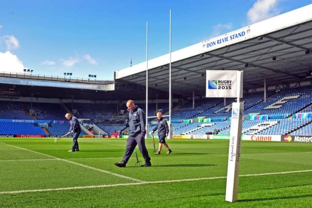 Leeds United staff prepare Elland Road, as the  ground is tranformed for this weekend's Rugby Union World Cup