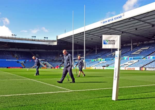 Leeds United staff prepare Elland Road, as the  ground is tranformed for this weekend's Rugby Union World Cup