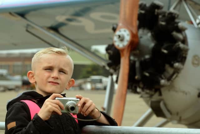 Brandon Sheard, 12, from Bradford watches the skies with his camera ready.