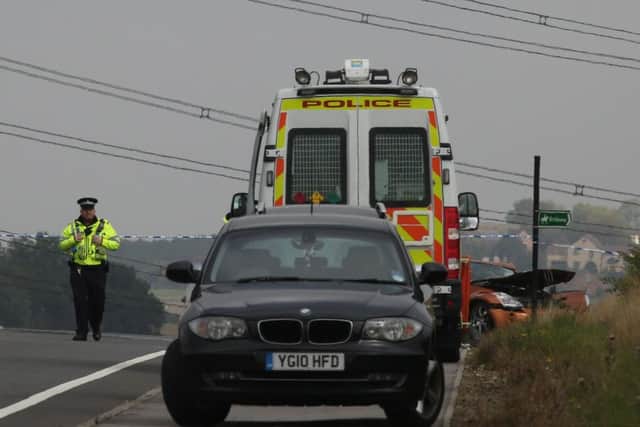 Police at the scene on the A6201 between Upton and Hemsworth near Pontefract.  Picture: SWNS