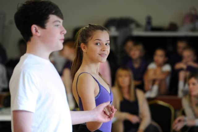 Date:4th October 2015. Picture James Hardisty, (JH1010/61c) Dancer Frankie Ball, aged 14, of Leeds, has undergone spinal surgery and said that her dance school, Maillot Rose School of Theatre & Dance, based at Harewood, near Leeds, has help to inspired her to get better so she could take part in the forthcoming production of cinderella, pictured with her dance partner Lewis Day.