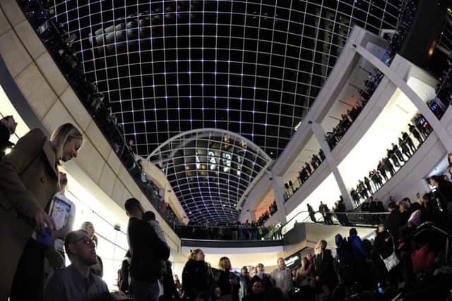 Trinity Leeds hosting a spectacular kaleidoscopic light and sound show, The Seventh Wave, which saw the centres impressive glass atrium transformed into a dramatic weather sky-scape, with huge beanbags underneath allowing people to become fully immersed in the show.  Picture: Bruce Rollinson
