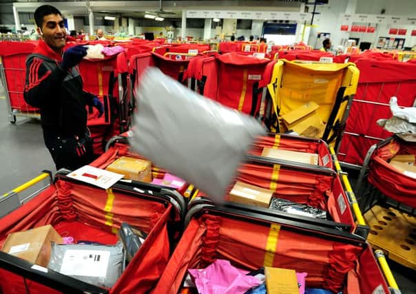 SORTED: Royal Mail staff sorting the mail. Photo: Rui Vieira/PA Wire