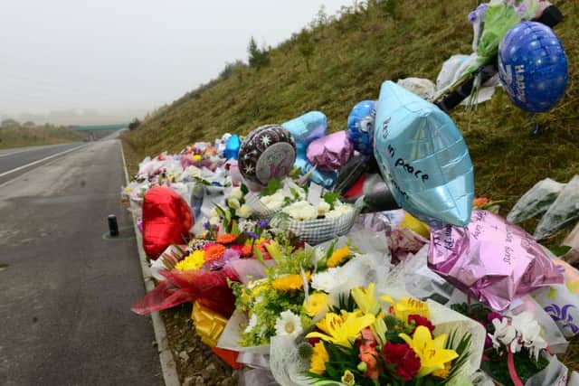 1 oct 2015...flowers at the scene of a RTA near Hemsworth where four people died when a quad bike collided with a sports car. Picture Scott Merrylees SM1009/67c