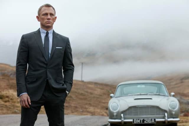 Daniel Craig as James Bond.