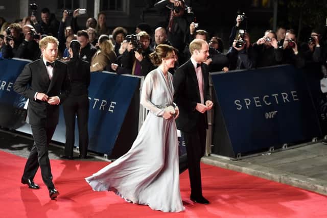 The Duke of Duchess of Cambridge with Prince Harry attending the World Premiere of Spectre, held at the Royal Albert Hall in London.