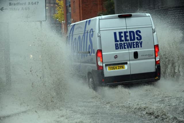 Update: Traffic nightmare as parts of Leeds city centre flooded - video