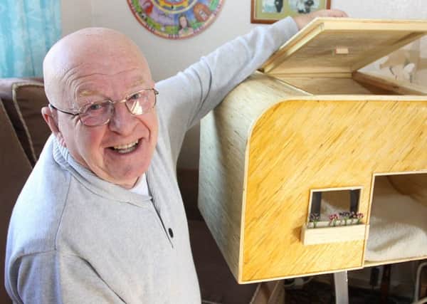 Mike Nunns who painstakingly made his cat a house made from 25,000 matches. Picture: Ross Parry Agency