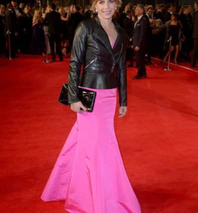 Darcey Bussell teams her biker with floor-length pink gown at the World Premiere of Spectre