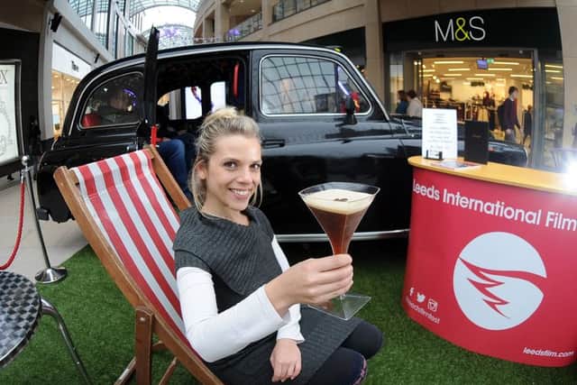 Leora Bermeister pictured with a cocktail by the Smallest Cinema, which is a London Taxi, at the Trinity Shopping Centre,Leeds...SH10014386k..4th November 2015 Picture by Simon Hulme