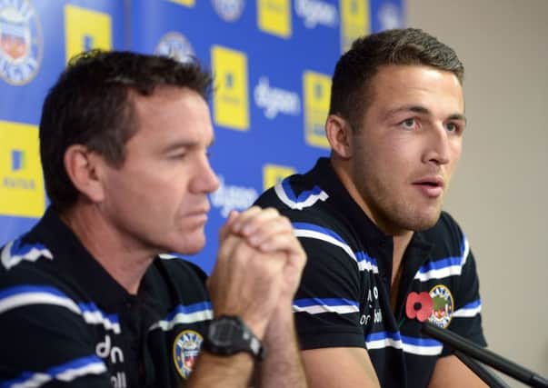 Sam Burgess (right) with Bath head coach Mike Ford (left) on the day he was unveiled at Bath.