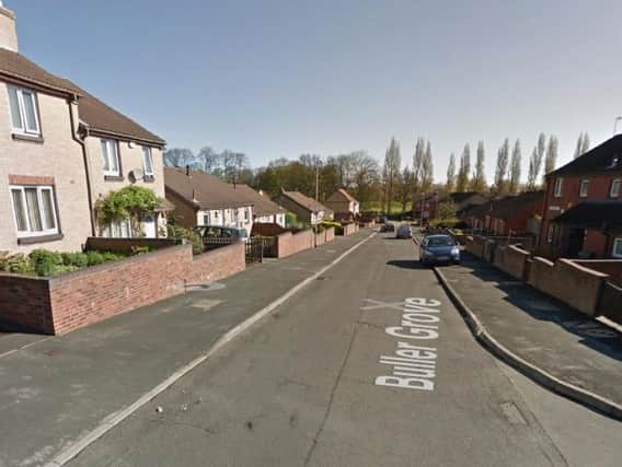 The woman was at home on Buller Grove, Harehills, when she was attacked