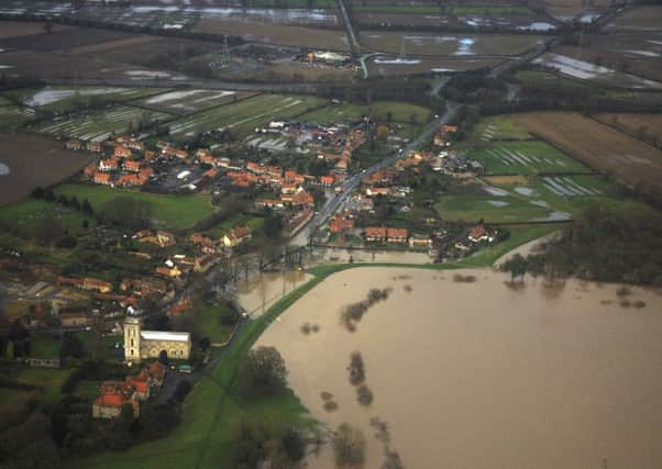 Library picture showing flooding in Old Malton looking towards the A64