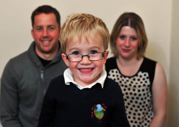Sam Brown, 6, with  parents Katy and Simon from Otley. Sam has Morquio syndrome.