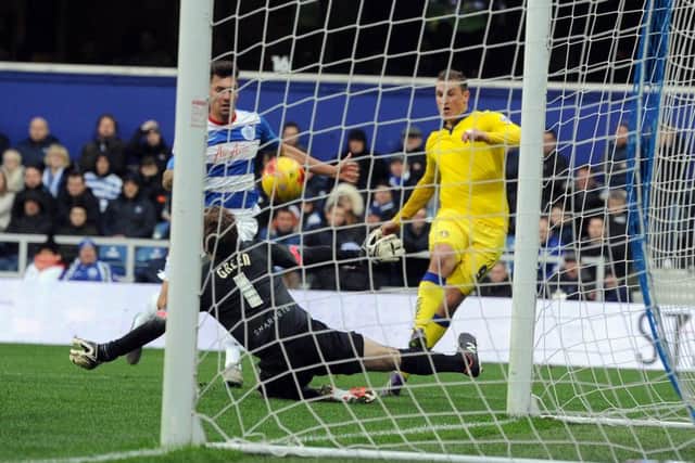 Leeds United's Chris Wood firers a shot over the head of Queens Park Rangers keeper Rob Green.