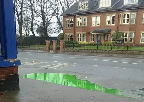 The puddle formed outside the YFC on Beeston Road