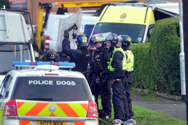 Police at the scene of an armed siege in Bramley, Leeds. Picture by Tony Johnson