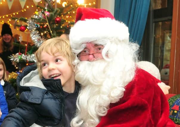 Youngsters at Martin House hospice in Boston Spa met Santa yesterday. Picture: Tony Johnson