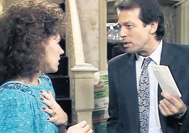 30 million tuned in on Christmas Day 1986 to see Den serve Angie divorce papers (BBC).