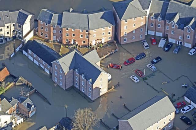 An aerial view of York, where more than 200 homes have been evacuated and a further 3,500 homes are still at risk. Picture: SWNS