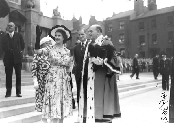 Princess Elizabeth waving to the crowd at Leeds Civic Hall, July 1949.