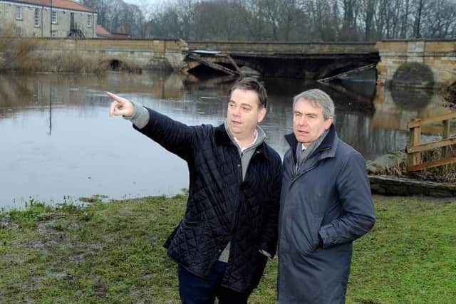 Robert Goodwill MP visited Tadcaster yesterday and was shown damage to the bridge by Nigel Adams MP.